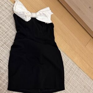 Elegant Black Dress with White Bow